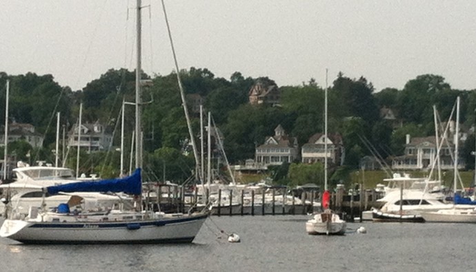 The handsome waterfront homes of Atlantic Highlands, NJ, keep watch on the harbor full of yachts.