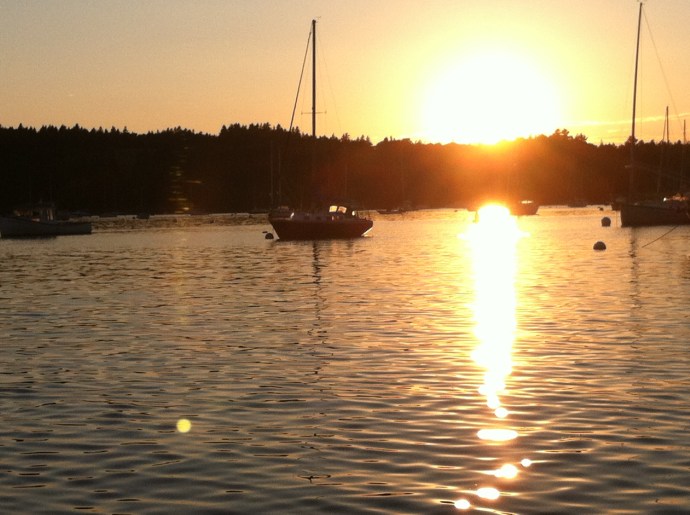 A quiet Buck's Harbor is bathed in the brilliant last light of the day.
