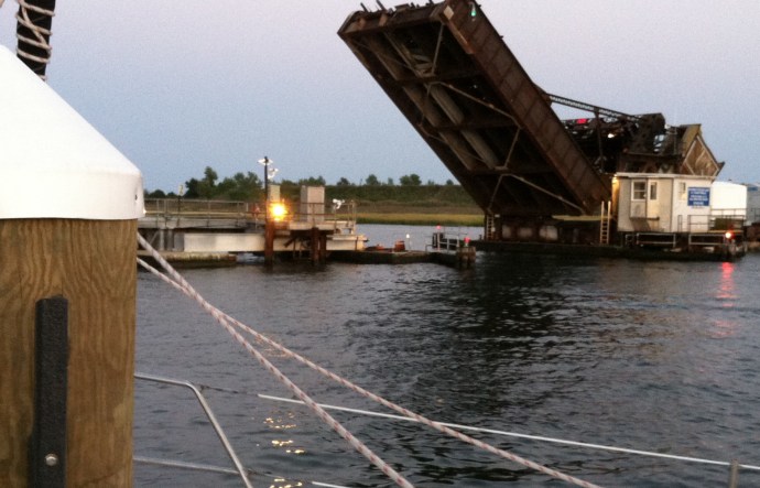 Bells ring whenever the railroad bridge lowers for the frequent commuter trains that cross the Manasquan Inlet.