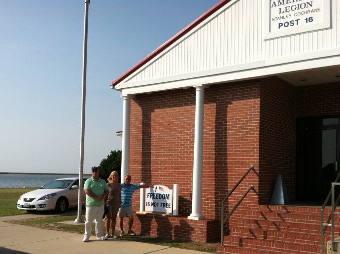Chip, Jane and Tony pause on the way to dine at the American Legion Post on the Crisfield waterfront.