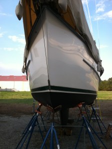 Polished and waxed, the hull reflected the  the late day sun and shadows.