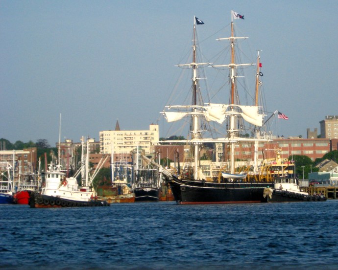 On a short hawser and with one on the hip, the Morgan eases off the State Pier.