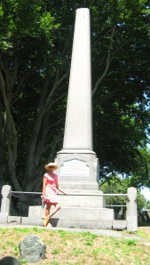 Kate pays her respects to the memorial to her forefather.