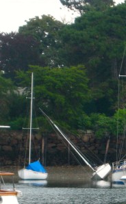 Drained by a moon tide, there are spots where even shallow draft boats are in the mud.