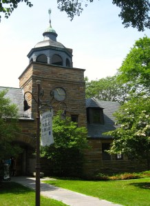 The stately library shares a park-like setting with Town Hall and the Congregational Church.