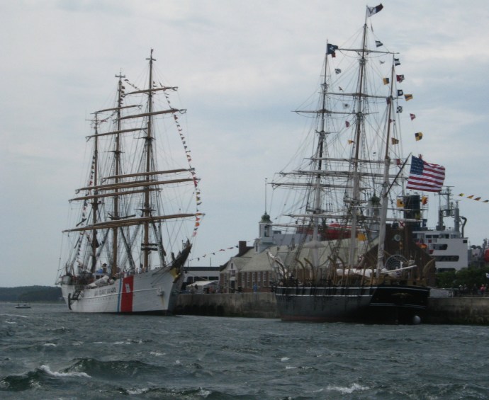 Coast Guard Cutter Eagle joined the Charles W. Morgan at the Massachusetts Maritime Academy pier, part of the celebration of the canal’s 100th anniversary.