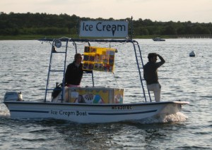 With lookout on the bow, the Ice Cream Boat trolls Onset Harbor.