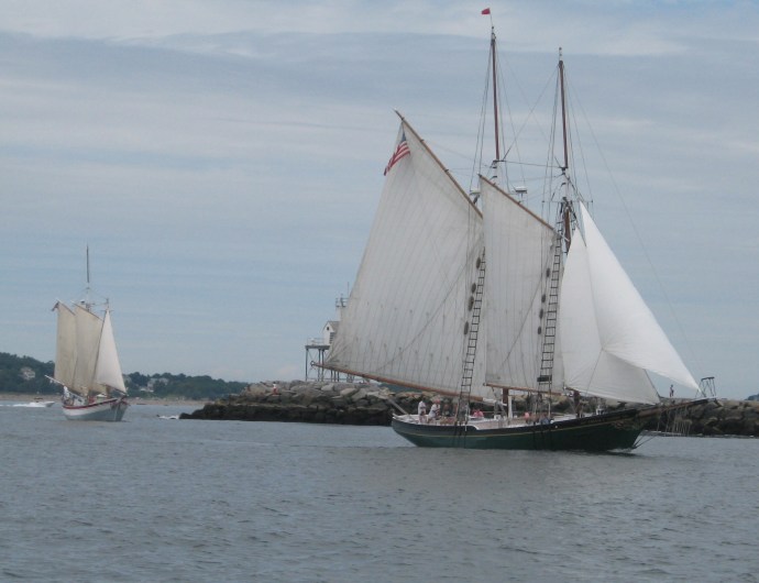 The 65-foot Thomas E. Lannon leads the double-ended "pinky" schooner Ardelle past the Gloucester breakwater.