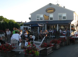 The Dogwatch offers seating inside, outside and at the Dog Pound on the pier.