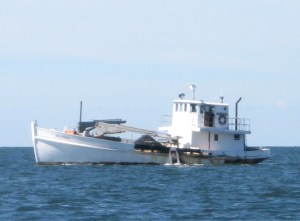 This dredger looks like a re-purposed Chesapeake buy boat.