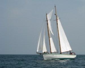 A schooner heels to the wind beating across Nantucket Sound.