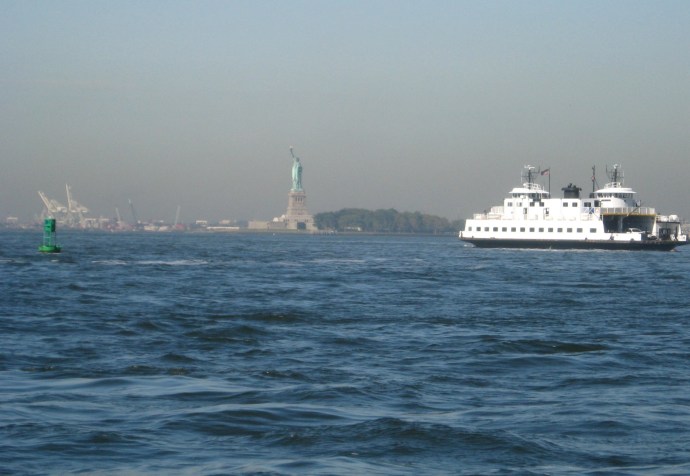 The Staten and Governor's Island ferries stir up the waters around The Battery.