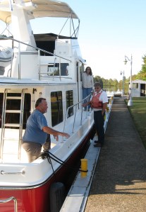 Robert provides direction to the crew of Sovereign.
