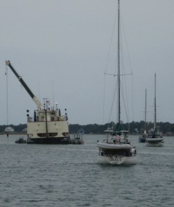 Snowbirds go single file past the Corps dredge.