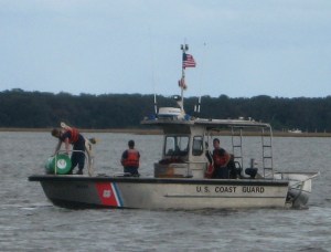 Green Can "79" is moved into position in King's Bay.