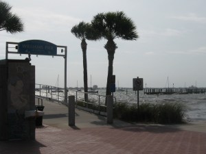 A chop built across Gulfport Harbor, splashing on Williams Pier.