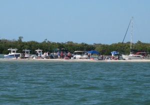 The beach at Pelican gets busy on weekends.