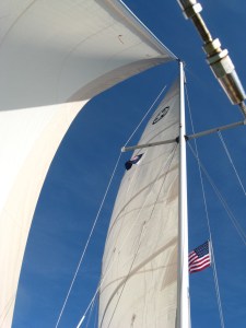 "With sails drawing full and by."